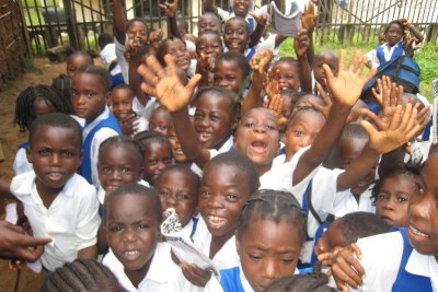 Excited Liberian pupils.
