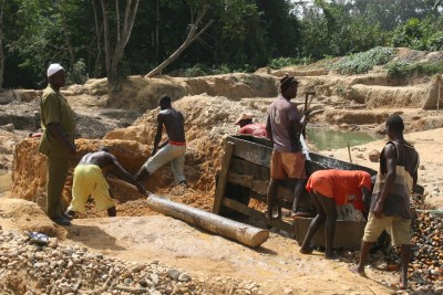 Artisanal diamond mine in Sandoh chiefdom, Kono district, Sierra Leone.
