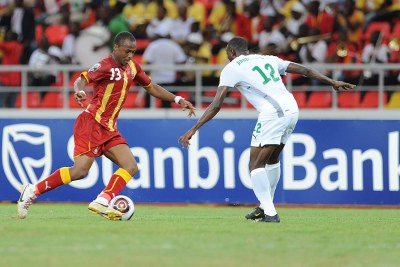 Dede Ayew of Ghana and Mohamed Koffi of Burkina Faso (file photo).
