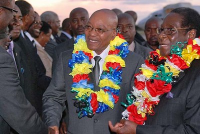 President Robert Mugabe, seen welcoming President Jacob Zuma on a past visit, is now unhappy with what his regional counterparts are saying.