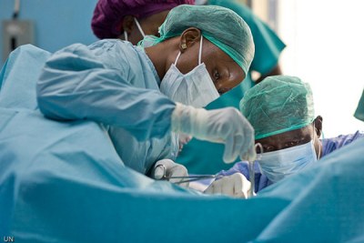 The continent is severely short of skilled medical personnel Female doctor performing an operation to correct Fistula