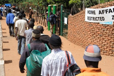 A queue outside the Department of Home Affairs (file photo).