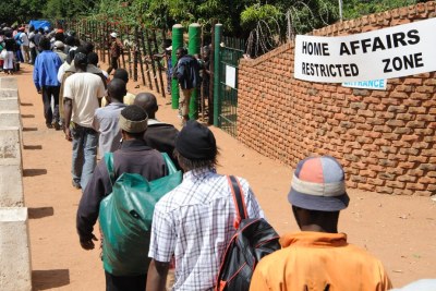 A queue outside a home affairs office (file photo).