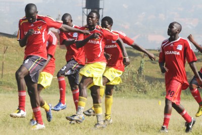 Bukenya of Uganda leads teammates through drills.