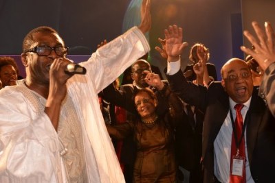 Youssou N'Dour, left, with Sudanese mobile phone pioneer Mo Ibrahim.