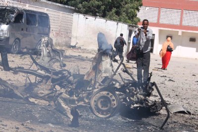 Car bomb wreckage (file photo): The explosions were the deadliest in the city since September 12  when three bombers killed at least 5 people at a hotel where Somalia's new president had been temporarily living.