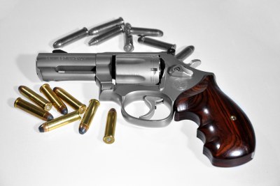 A handgun and bullets.