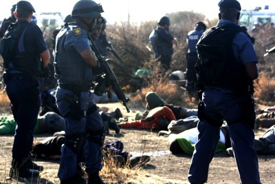 Police after the killings at Marikana in South Africa's North West Province in August 2012.