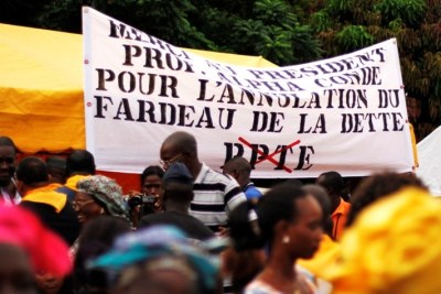 Guineans rally in support of President Alpha Condé for achieving debt relief for the country.