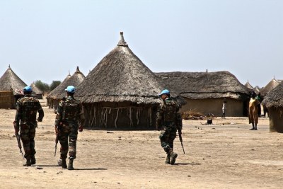 Peacekeepers patrol the South Sudanese village.