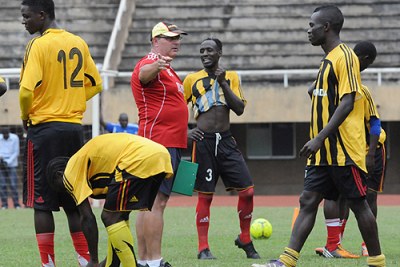 Ugandan Cranes head coach Bobby Williamson takes the boys through a training session at Namboole, the team is set to defend its Cecafa title. (File Photo)