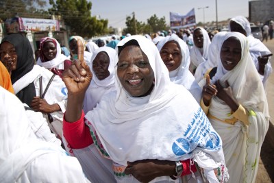 Women in Darfur march for 16 Days of Activism against Gender-Based Violence (file photo)