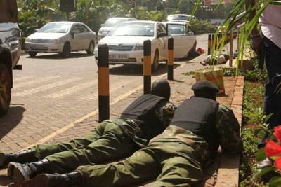 Security forces help disarm terrorists at the Westgate mall.