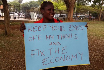 The Ugandan Women's Network organised a protest against harassment and attacks that have followed the signing of the Anti-Pornography Bill. Women, and some men, have been attacked for their attire - women for wearing mini-skirts and men for wearing sagging trousers.