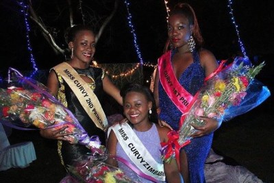 Miss Curvy 2014 Sheila Chikengezha flanked by second princess Chengetayi Mnisi (left) and first princess Chantelle Jeradi (right)