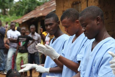 Volunteers in Liberia, Sierra Leone and Guinea work with the Red Cross to prevent and treat Ebola cases. Fears of Ebola in the United States could compromise their efforts.