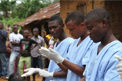 (Photo d'archives) - Le travail de volontaires dans des pays touchés comme la Guinée, porte ses fruits au vue du nombre de patients guéris