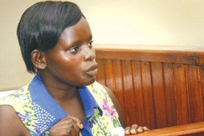 Jolly Tumuhiirwe, caught on video beating a toddler, says she was attacked first by the baby's mother.