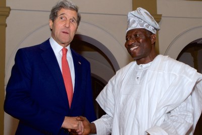 President Goodluck Jonathan meets U.S. Secretary of State John Kerry upon his arrival at the State House in Lagos on Sunday.