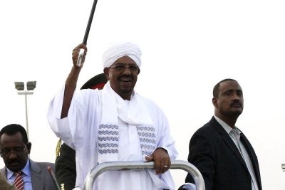 Sudanese President al-Bashir returned to a warm welcome after attending the African Union summit in South Africa. He left the country as a court debated whether an ICC arrest warrant should be acted upon by the government.