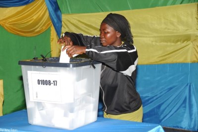 A voter in Kiyovu casts her vote during a local election (file photo).