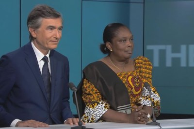 France's Philippe Douste-Blazy, a former health, culture, and foreign affairs minister and Liberia's Minister of Health Bernice Dahn