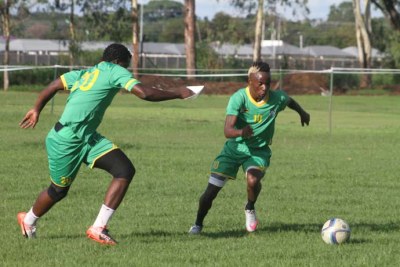 Kudakwashe Mahachi tackles defender Oscar Machapa during training.