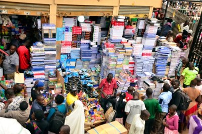 A cross-section of traders and customers at one of the busiest sections of Kikuubo Trading Centre in Kampala (file photo).