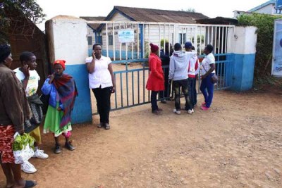Patients stranded outside the gate of the Nyeri County Referral Hospital during a past strike.
