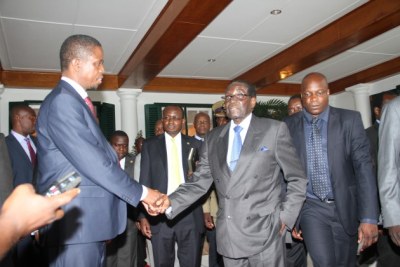President Edgar Lungu with President Robert Mugabe (file photo).