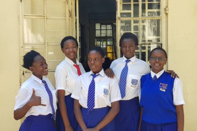 From left: Stacy Owino, Purity Achieng, Ivy Akinyi, Synthia Otieno and Macrine Atieno outiside a classroom in school. The five girls from Kenya will be representing Africa in the annual Technovation challenge in San Francisco.