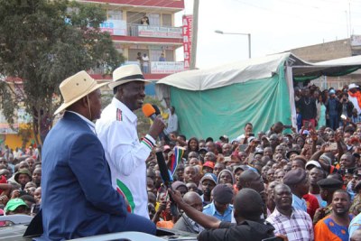 Nasa presidential candidate Raila Odinga with former Kajiado Governor David Nkedianye (left) during a campaign rally in Kitengela, Kajiado County.