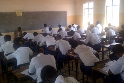 Children writing exams (file photo)