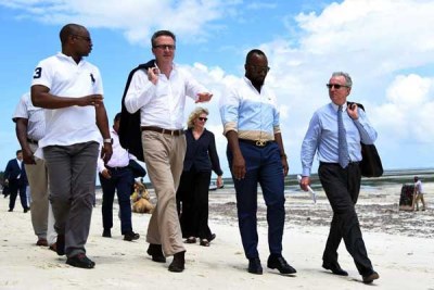 From left: Kilifi Governor Amason Kingi, British High Commissioner Nic Hailey, Mombasa Governor Hassan Joho and French Ambassador Antoine Sivan walk on the beach after a meeting on November 6, 2017.