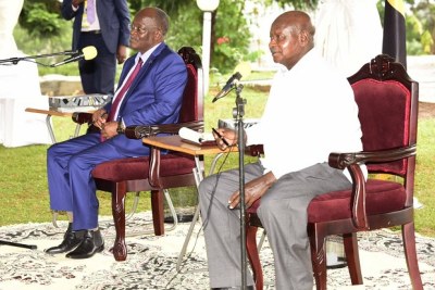 President John Magufuli and President Yoweri Museveni at Masaka State Lodge.