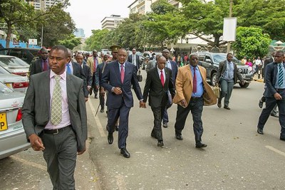 President Uhuru Kenyatta walks to Harambe House.