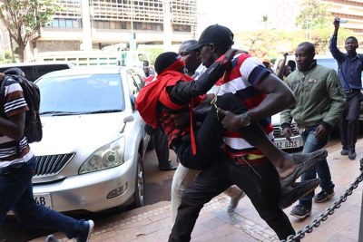 A Makerere University student and anti-age limit protester was manhandled by plain-clothes security officers at Parliament today.