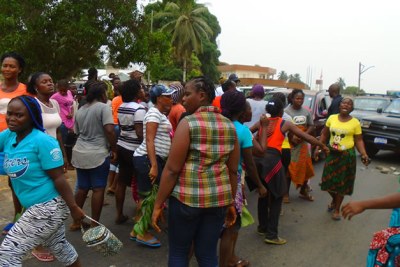 Aggrieved wives of Liberian soldiers protesting