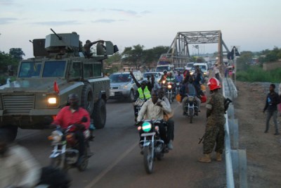 UPDF trucks carrying Ugandans and others from several countries who had been stranded in South Sudan.