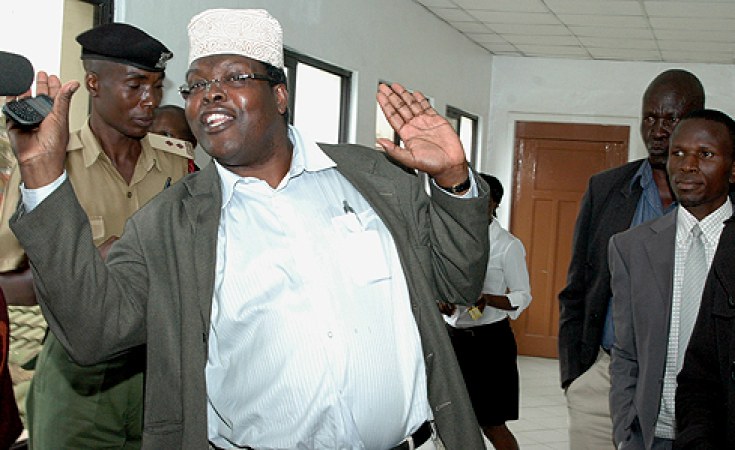 Image result for Miguna Miguna shows his air ticket to Nairobi