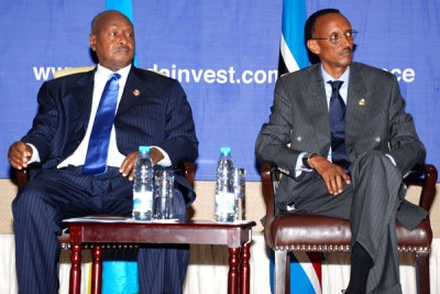 President Yoweri Museveni with his Rwandan counterpart Paul Kagame, right,  at the East African Investment Conference in Kigali, Rwanda on June 26, 2008.