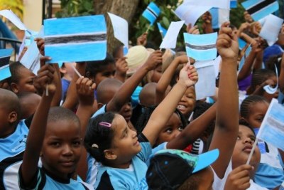 Schoolchildren in Botswana, which has jumped eight places up on the UN's Human Development Index in the past five years. Girls can expect to stay in school for 12.8 years and boys 12.5 years in Botswana, while women can expect to live for an average of 70 years and men 65 years.