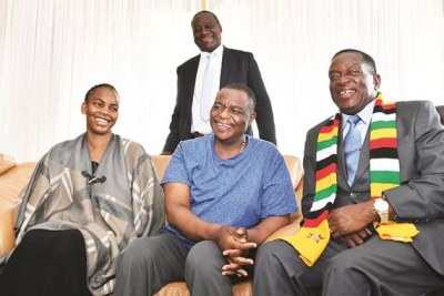 President Emmerson Mnangagwa speaks to Vice President Constantino Chiwenga and his wife Marry in Harare. Chiwenga had been in South Africa for treatment.