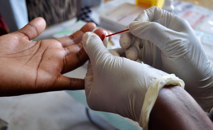 Kim Cloete A participant in research into HIV infections is tested for the virus