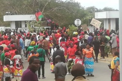 MCP supporters march to Capital Hill in protest against poll results