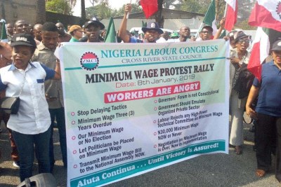 File photo of members of the Nigeria Labour Congress protesting over non-implementation of the new minimum wage in Calabar.