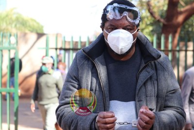 Hopewell Chin'ono arrives at the Harare Magistrates' Court (file photo).