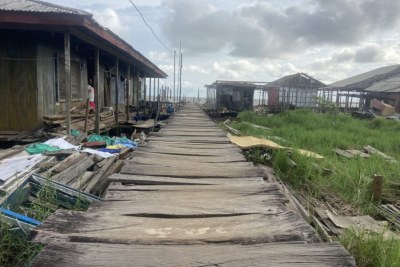 Some remaining buildings, now at risk, in Ayetoro.