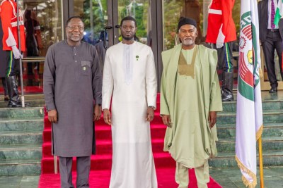 Dr. Omar Alieu Touray, President of the Commission of the Economic Community of West African States (ECOWAS) (left), Bassirou Diomaye Faye President of Senegal (center) and H.E. Yusuf Maitama TUGGAR, Minister of Affairs foreigners from Nigeria (right)