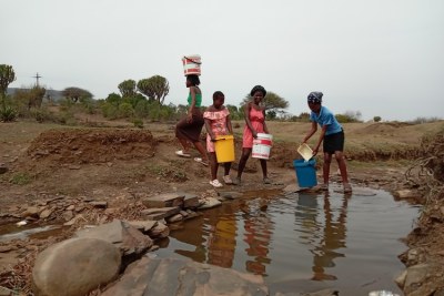 Learners fetch water from the river, which they say is dirty.